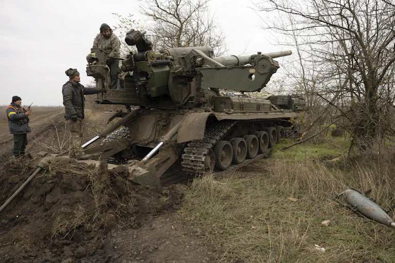 Ukrainian servicemen operate with the self-propelled 203mm cannon 'Pion' on their position in Kherson area, Ukraine, 09 November 2022