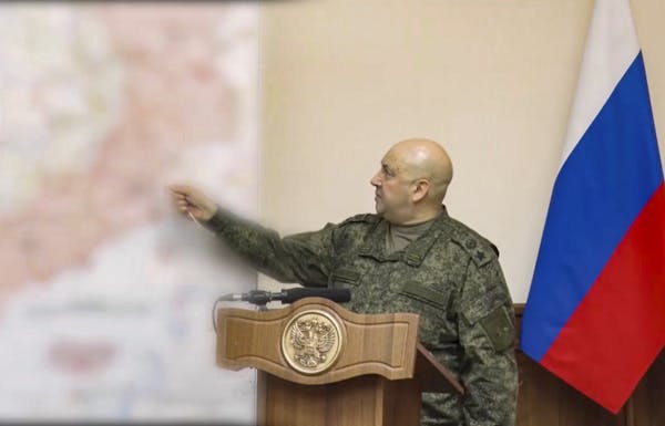Sergei Surovikin, commander of Russia's troops in Ukraine, points to a map while explaining his decision to withdraw from the city of Kherson.