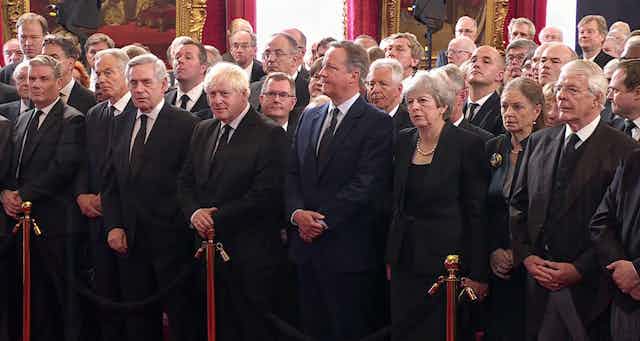 UK politicians standing together in a large group