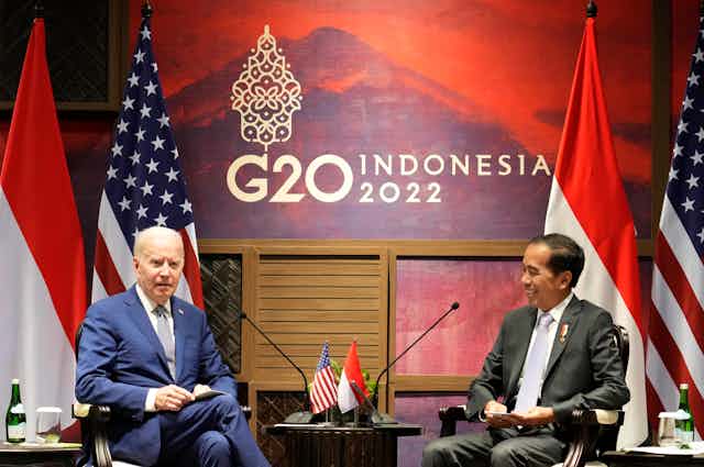 President Joe Biden (L) talks with Indonesian President Joko Widodo during their bilateral meeting ahead of the G20 Summit in Nusa Dua, Bali, Indonesia, 14 November 2022.
