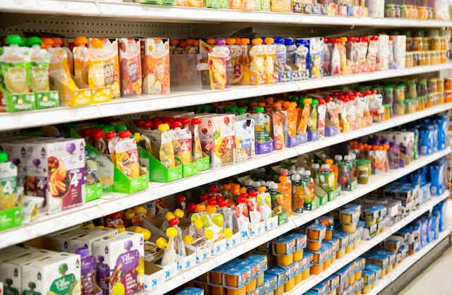 supermarket shelves with toddler food pouches