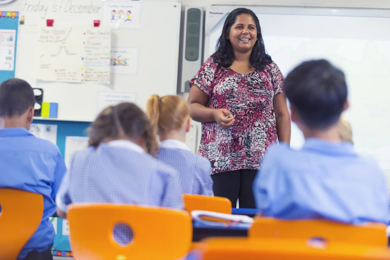 Teacher in front of a class.