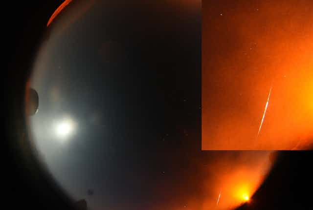 A fisheye photograph showing a circle of night sky with a fireball streaking across it. A zoomed in section shows the fireball in more detail.