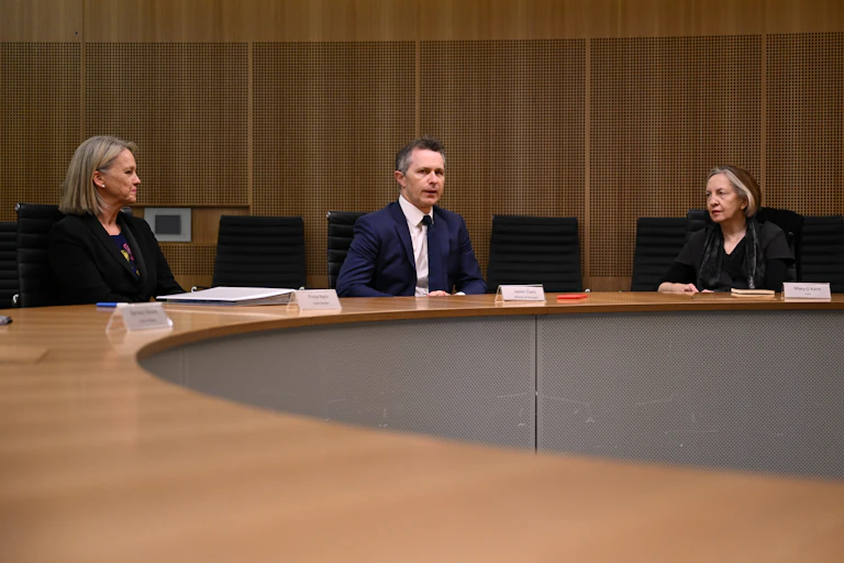 Education Minister Jason Clare with members of the Universities Accord panel. Fiona Nash (L) and panel chair Mary O'Kane (R).