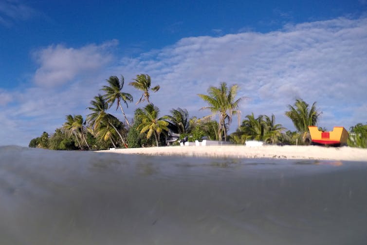 Tuvalu island pictured from the sea surface