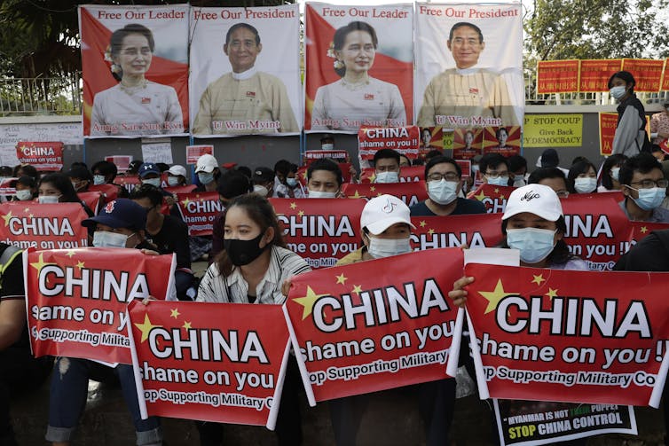 Pro-democracy demonstrators protest outside the Chinese embassy in Yangon, Myanmar, February 20 2021