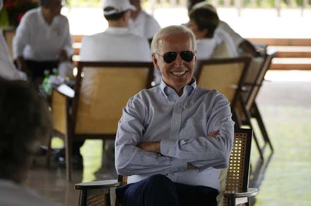Joe Biden smiles as he is photographed at the G20 summit in Bali, November 2022.