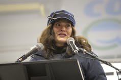 Michigan Governor Gretchen Whitmer speaks during a vigil for the victims of Oxford High School shooting.