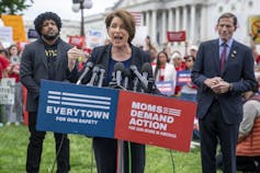 US Senator from Minnesota Amy Klobuchar speaks during a gun control rally in Washington DC, May 2022.