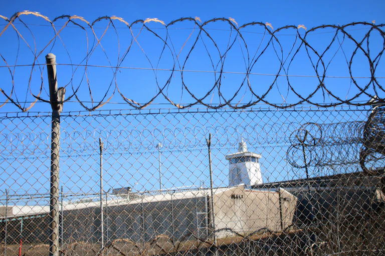 Don Dale youth detention centre. The centre is surrounded with barbed wire fencing.