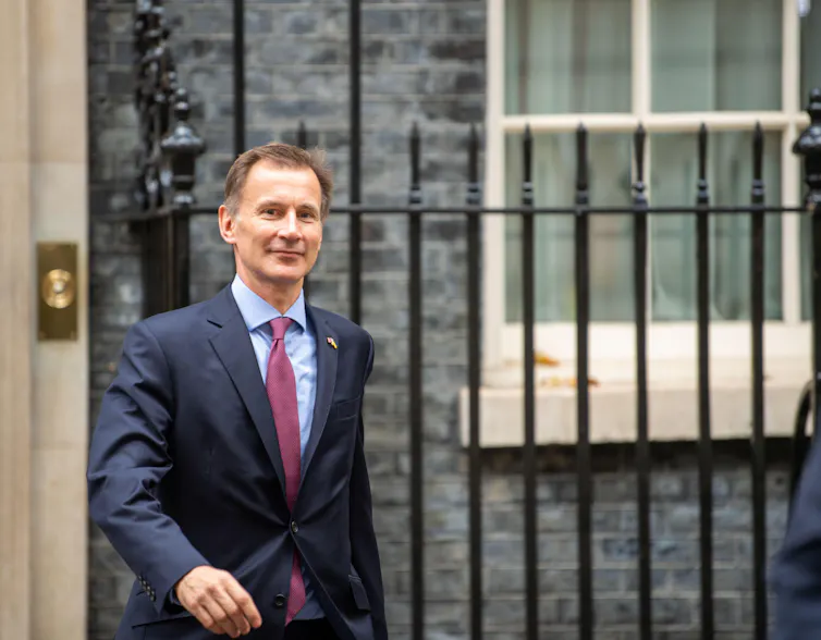 Jeremy Hunt, UK chancellor, walking out of Number 10 Downing Street.