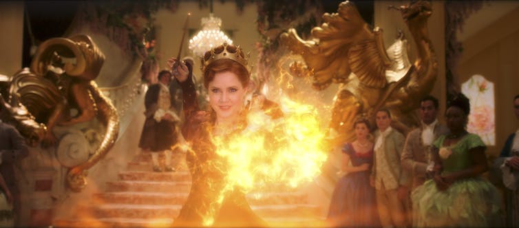 A woman at a ball casts a spell.