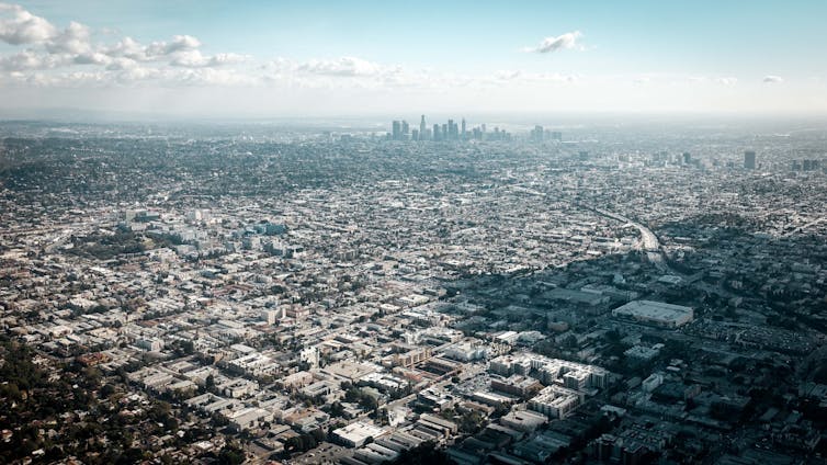 A bird's eye view of a sprawling cityscape.