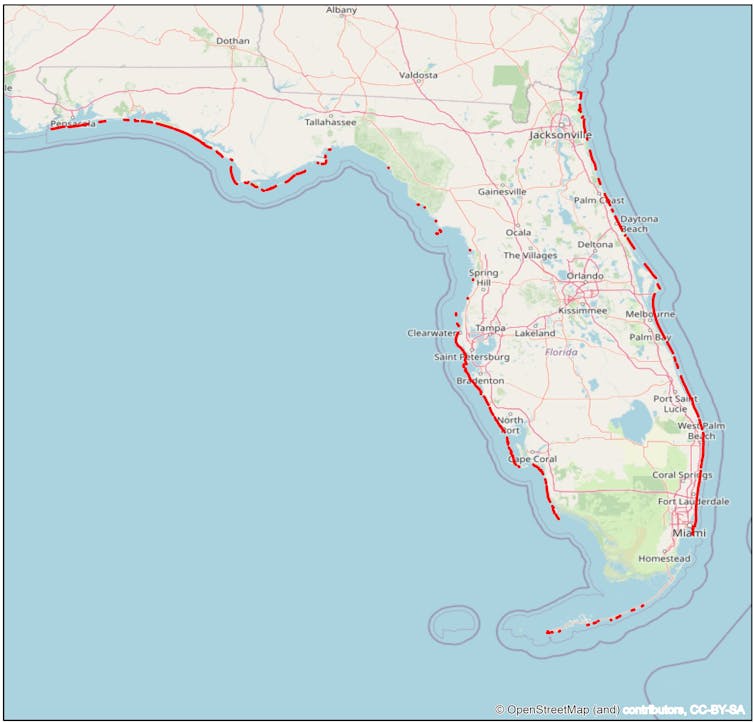 Map showing red lines along most of Florida's coast, except at wetlands areas and at the bend toward the Panhandle.