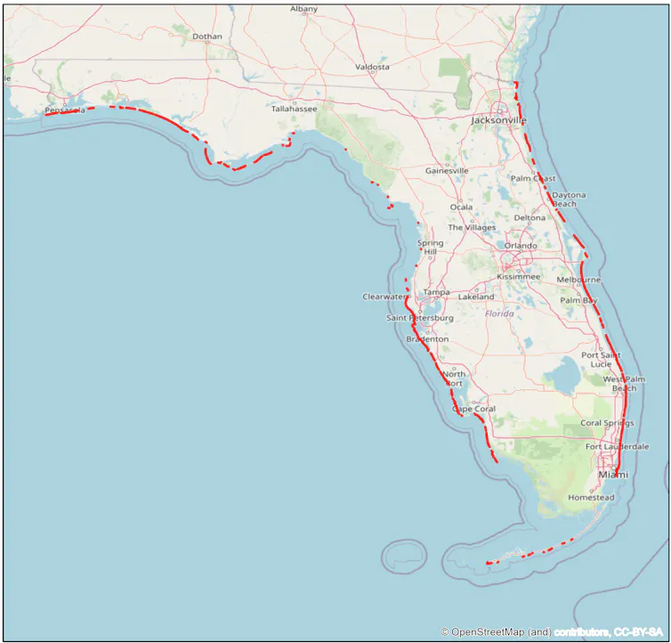 Map showing red lines along most of Florida's coast, except at wetlands areas and at the bend toward the Panhandle.