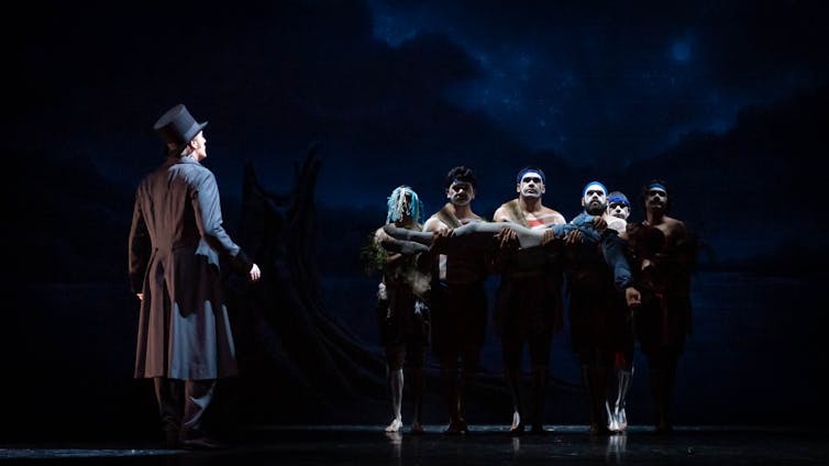 Noongar dancers carry Odette.