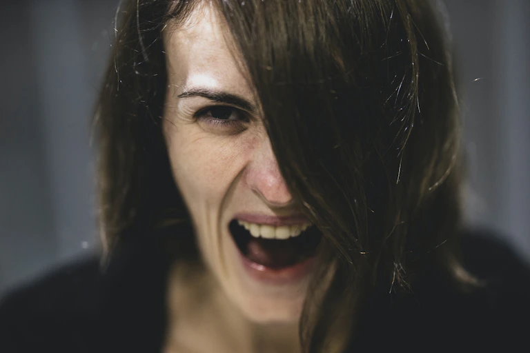 Woman screaming