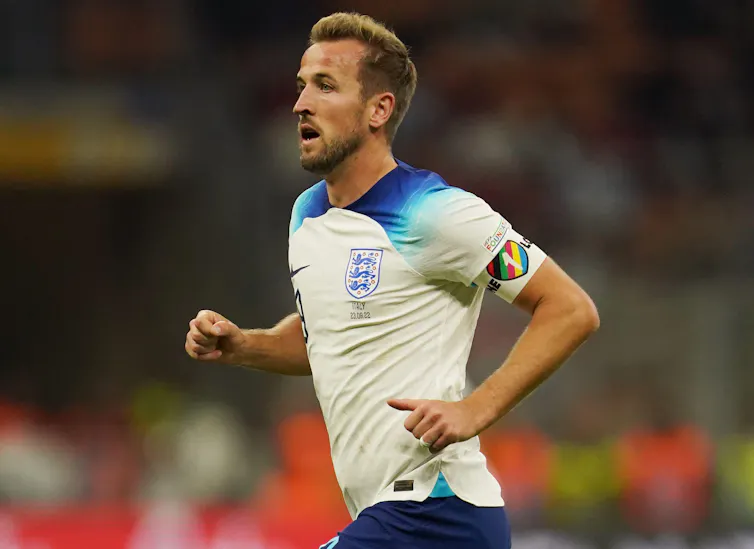 A footballer runs