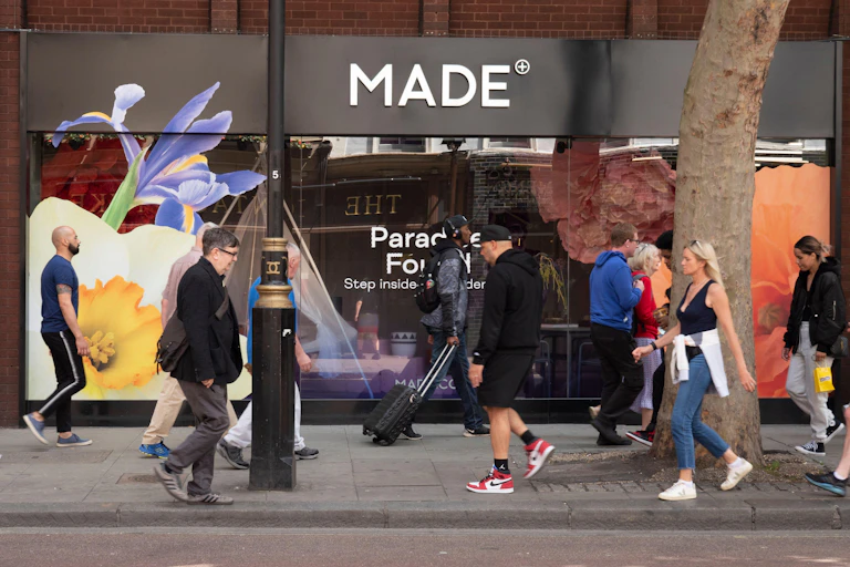 People walk past the London showroom of Made.com, the online furniture retailer.