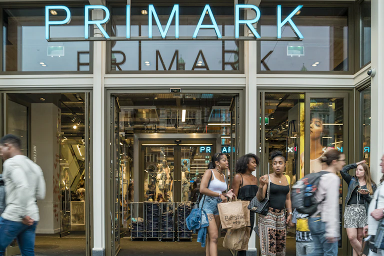 Motion blur people walking shopping at the Primark shopping mall Amsterdam Primark Damrak June 2017.