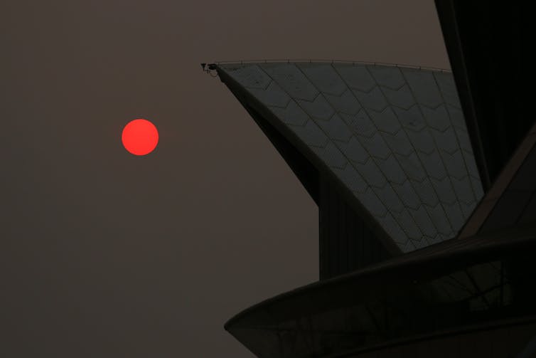 Building with a red sun
