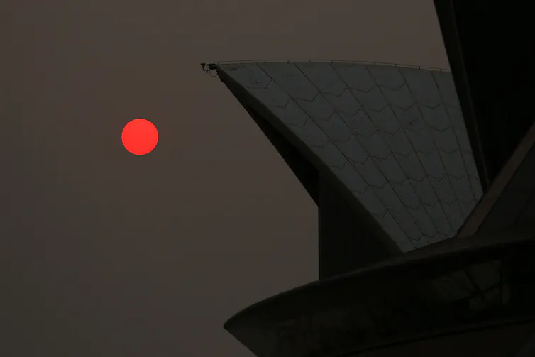 building with red sun