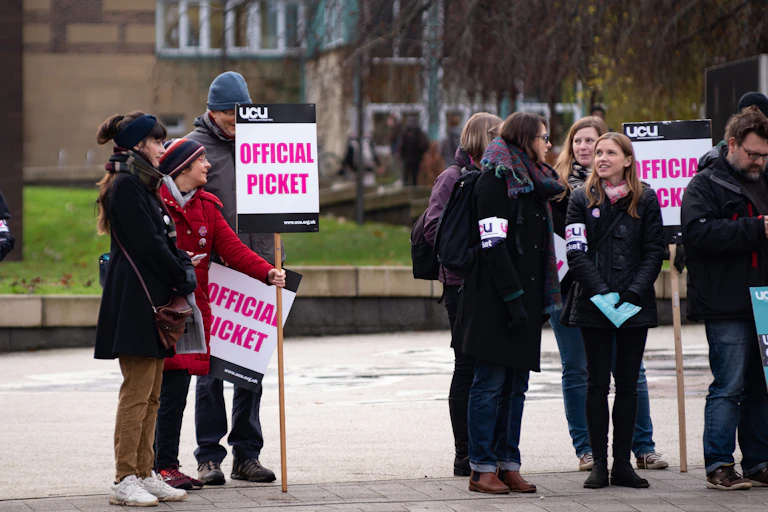 People on picket line with placards
