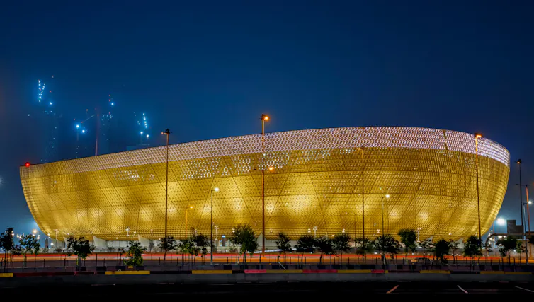 A football stadium at night.
