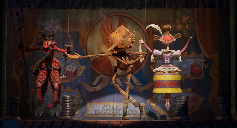Pinocchio performs in a circus act, a still from the movie.