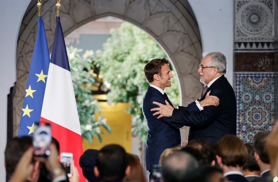French president Emmanuel Macron greets the rector of the Grand Mosque of Paris