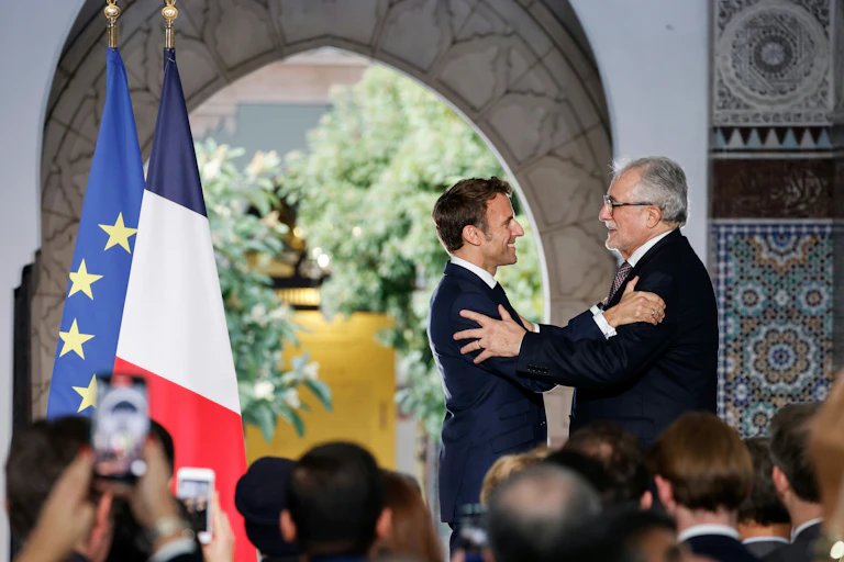 French president Emmanuel Macron greets the rector of the Grand Mosque of Paris