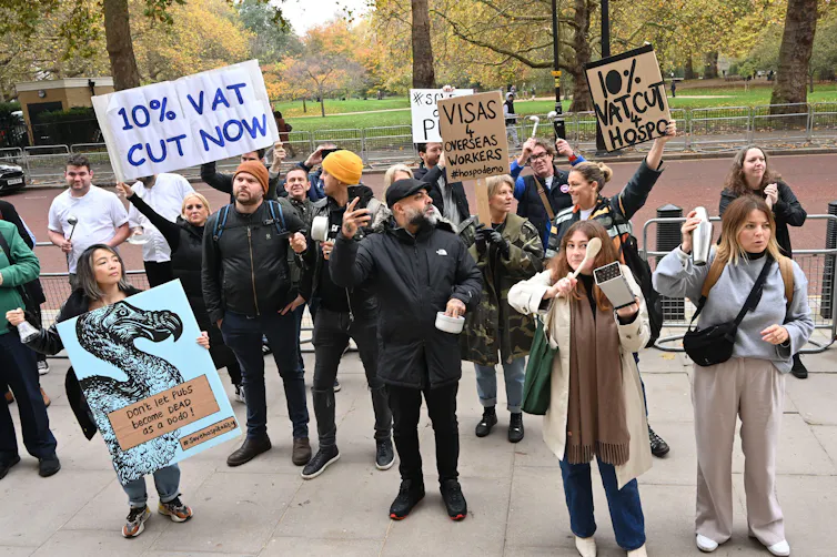 Protestors in Parliament square, London, England on November 22 2022. A demonstration to save the hospitality industry in front of HM treasury to demand VAT is reduced to 10% on all sales, including alcohol.