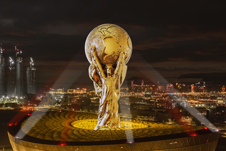 Illustration of World Cup trophy towering over stadium.