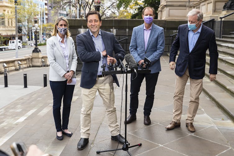 Matthew Guy addresses the media on the Victorian Parliament steps.