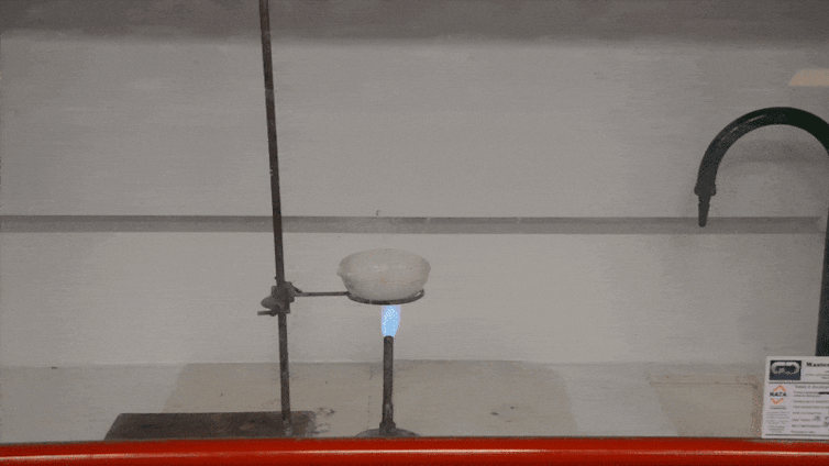 Video showing a plate above a bunsen burner spontaneously burst into flame