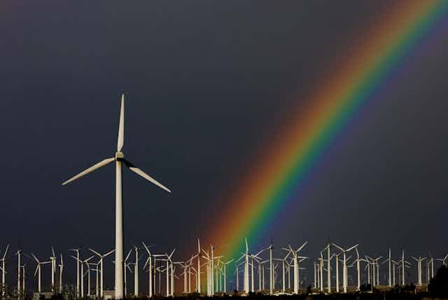 rainbow shines om wind farm