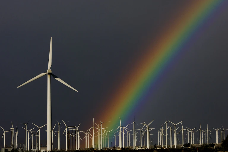 rainbow shines om wind farm