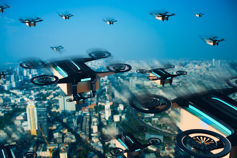 Artist depiction of delivery drones flying through the sky above a large city