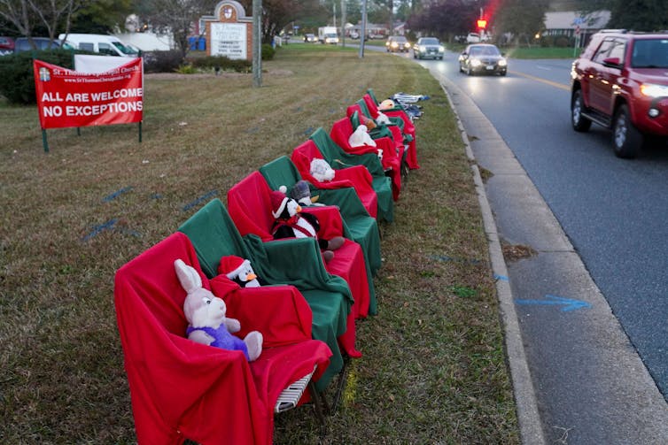 Chairs with stuffed animals sit outside St. Thomas Episcopal Church representing the victims of a mass shooting at a Walmart near the church, in Chesapeake, Virginia, U.S. November 23, 2022.