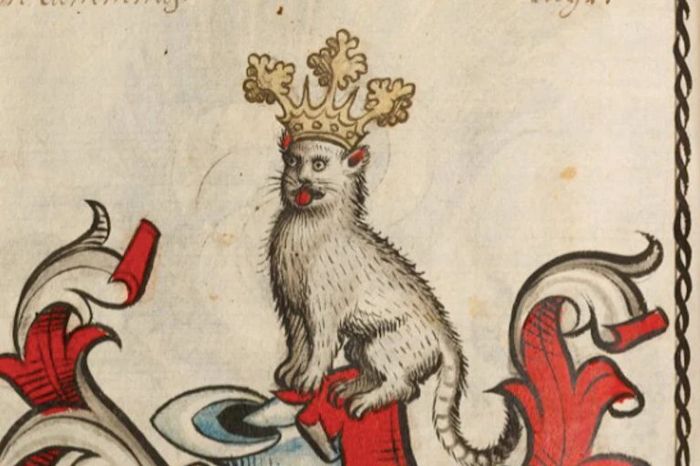 A crude manuscript doodle shows a cat sticking out his tongue, wearing an ornate crown.