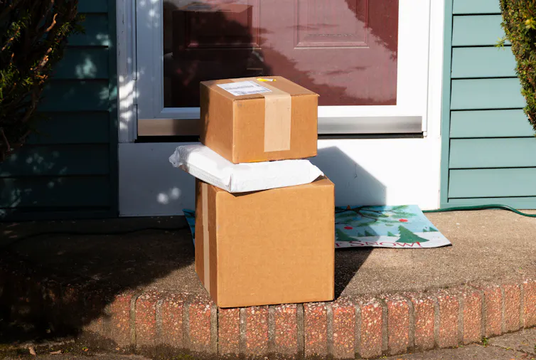 Boxes pile up on a porch