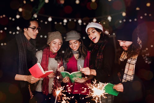 singing Christmas carols together isn't just a tradition, it's also good for you