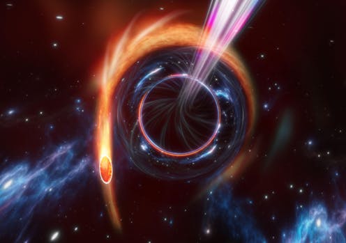 Astronomers witness the dying flare of a star torn apart by a black hole halfway across the Universe