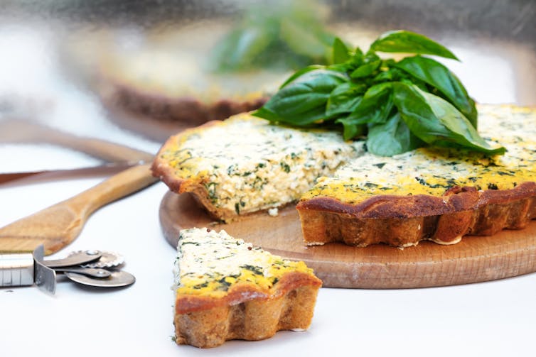Quiche on a chopping board