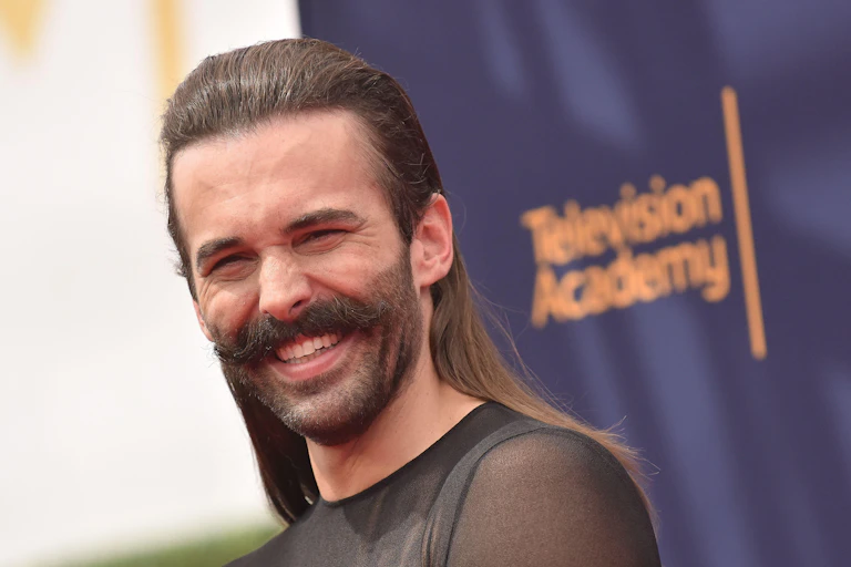 Jonathan Van Ness smiles on the red carpet of the Television Academy.