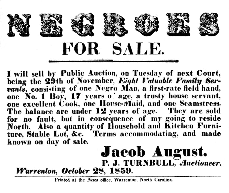 Large black letters appear on a white sheet of paper announcing the sale of a Negroes.