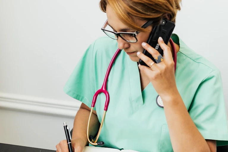 Doctor writes notes