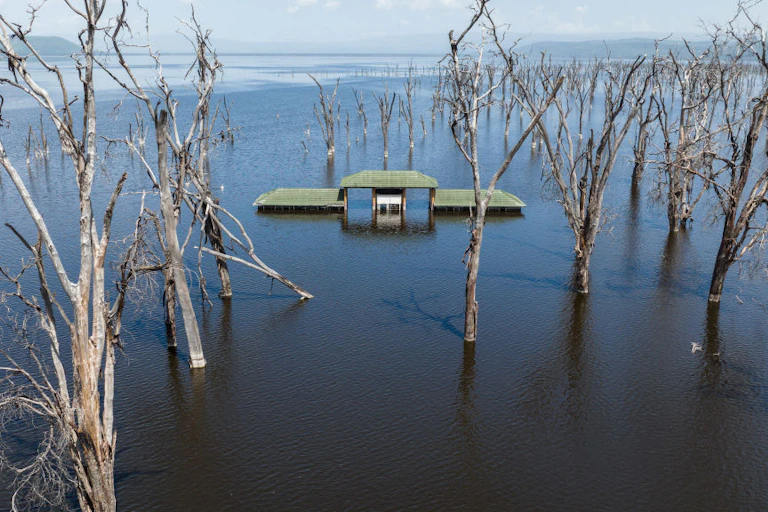 A building marooned in a flooded lake basin