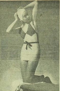 A woman in a one-piece bathing suit.