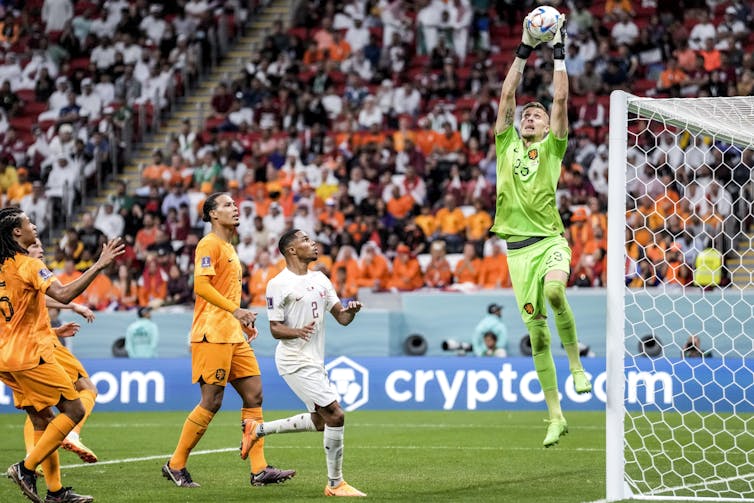 Goalkeeper Andries Noppert of the Netherlands saves a ball during the World Cup group A soccer match between the Netherlands and Qatar.